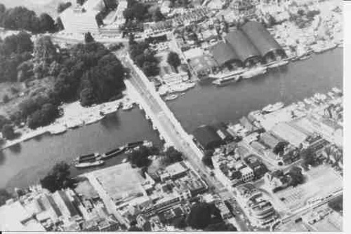 Aerial view of the Gridley Miskin timber yards on opposite sides of the river downstream of the bridge. Picture probably taken in the 1970’s. Aerial view of the Gridley Miskin timber yards on opposite sides of the river downstream of the bridge. Picture probably taken in the 1970’s.